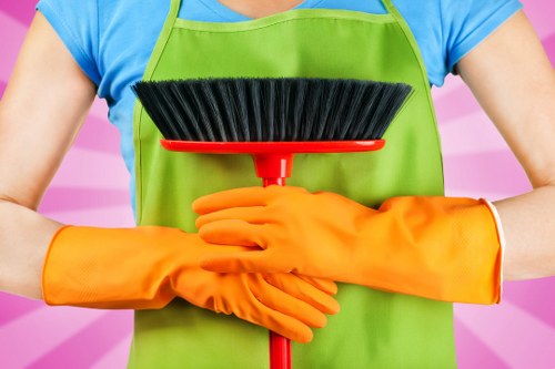 Staff member reviewing safety procedures before cleaning