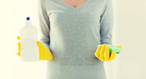 Office cleaners maintaining a clean workspace in Belsizepark